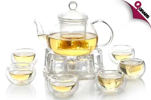 From QR89 Drink Up with an Elegant Glass Tea Set - Includes Teapot, Teacups & Teapot Warmer! (Up to QR298 Value)